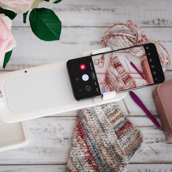 Overhead phone stand with mobile filming knitting