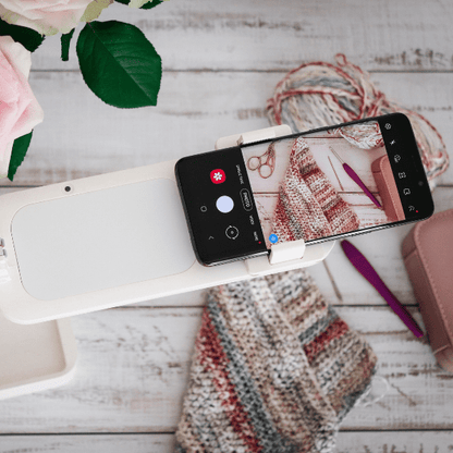 Overhead phone stand with mobile filming knitting